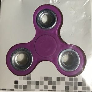 Item# 304. New purple fidget spinner.